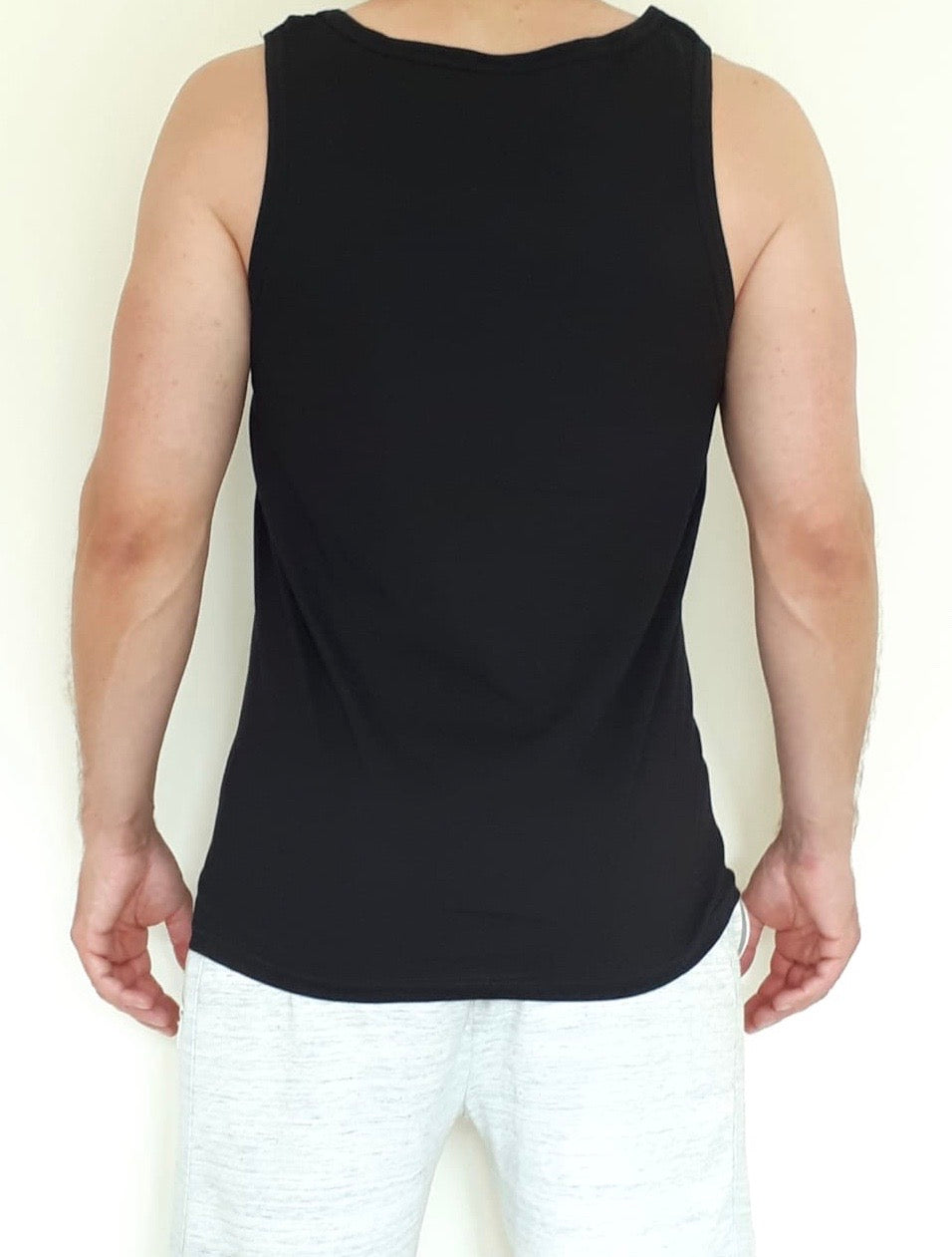 Men's black vest with Solo Traveller text. View of the back
