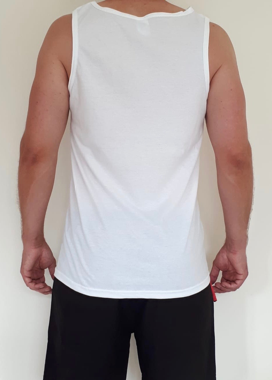 Men's white vest with Solo Traveller text. View of the back